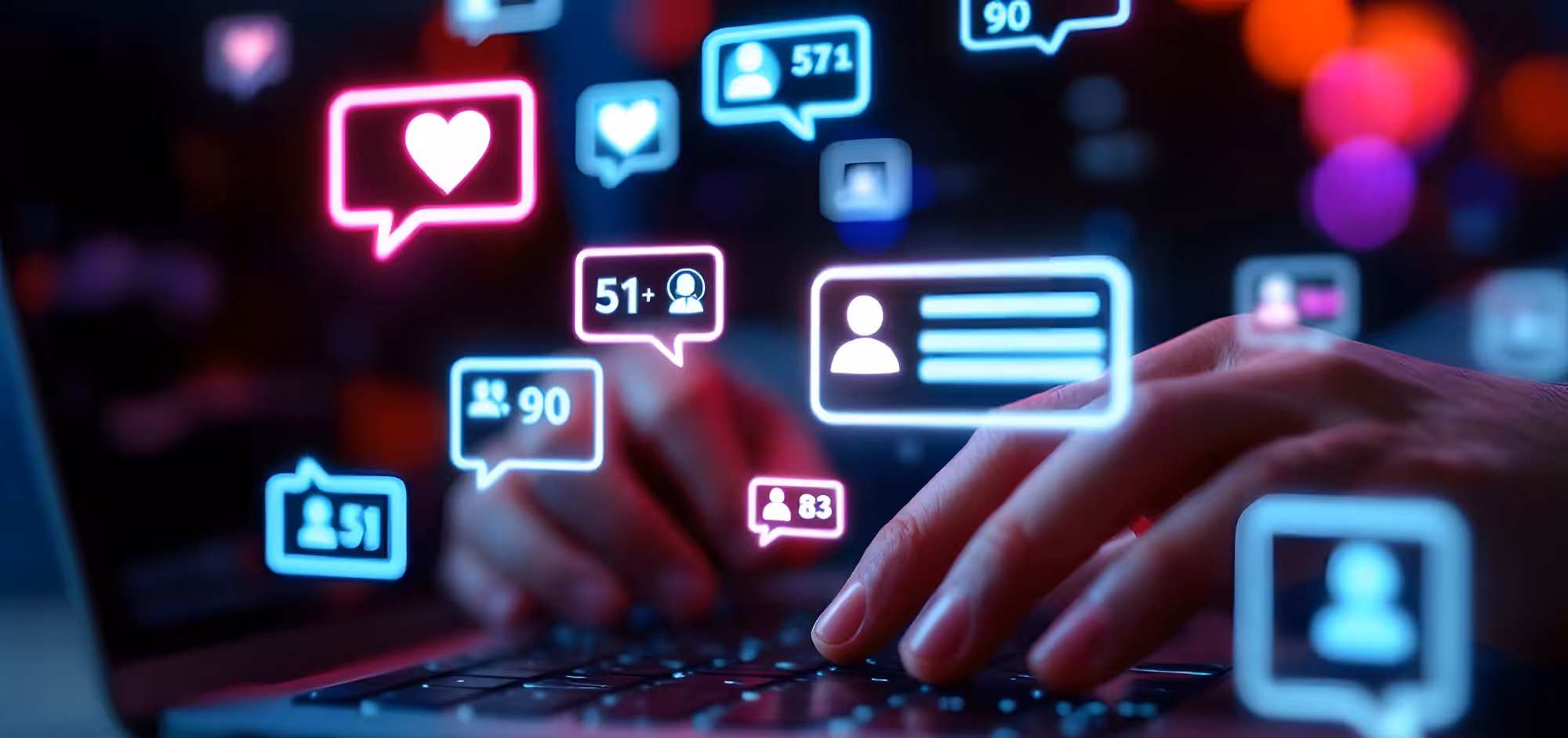 Marketing trend image, a hand on a keyboard with likes and comments floating above